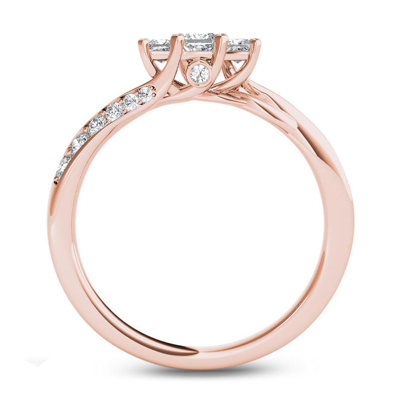 1/2 CT. T.W. Princess-Cut Diamond Three Stone Twist Shank Ring in 14K Rose Gold
