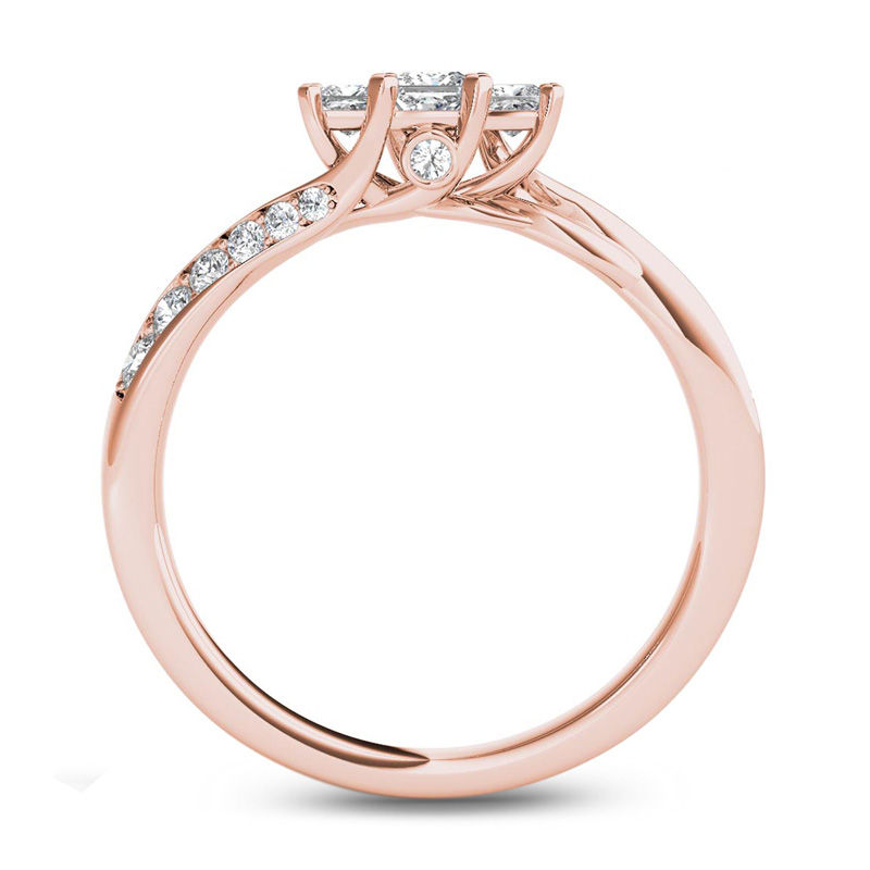 Main Image 3 of 1/2 CT. T.W. Princess-Cut Diamond Three Stone Twist Shank Ring in 14K Rose Gold