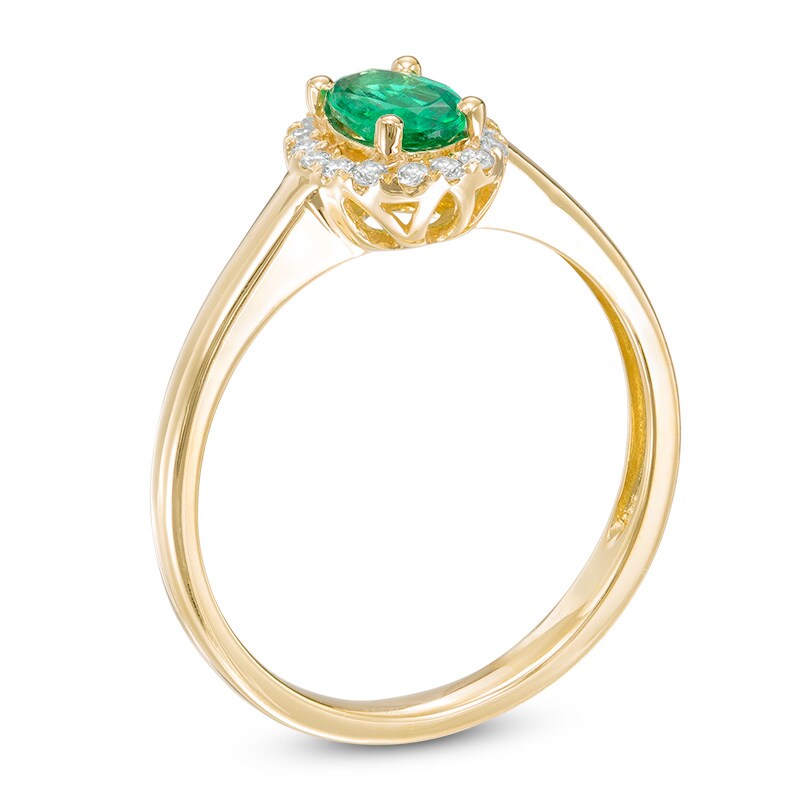 Main Image 2 of Oval Emerald and 1/10 CT. T.W. Diamond Frame Ring in 10K Gold
