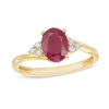 Thumbnail Image 1 of Oval Ruby and 1/10 CT. T.W. Diamond Tri-Sides Ring in 10K Gold