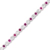 Thumbnail Image 1 of Lab-Created Ruby and White Sapphire Tennis Bracelet in Sterling Silver - 7.25"