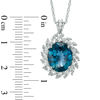 Thumbnail Image 1 of Oval London Blue and White Topaz Flower Pendant in Sterling Silver