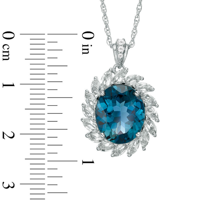 Oval London Blue and White Topaz Flower Pendant in Sterling Silver