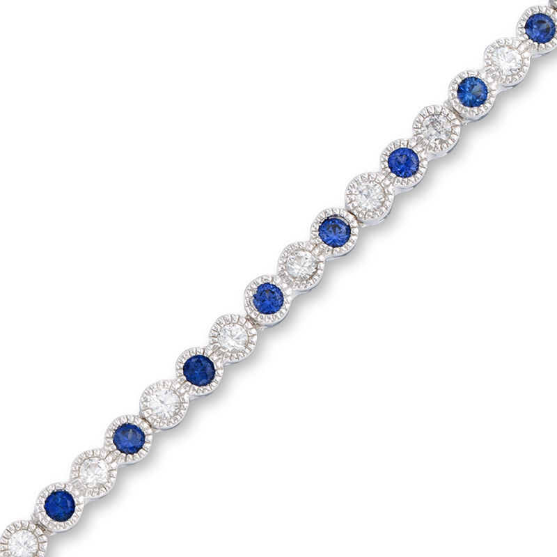 Main Image 1 of Lab-Created Blue and White Sapphire Tennis Bracelet in Sterling Silver - 7.25"