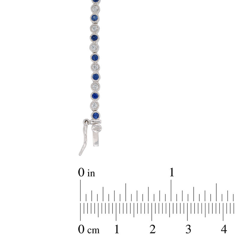 Main Image 2 of Lab-Created Blue and White Sapphire Tennis Bracelet in Sterling Silver - 7.25"