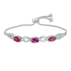 Thumbnail Image 0 of Oval Lab-Created Ruby Three Stone Bolo Bracelet in Sterling Silver - 9.5"