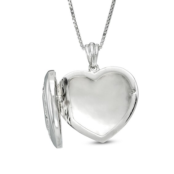 1/20 CT. T.w. Diamond Triple Heart Locket in Sterling Silver