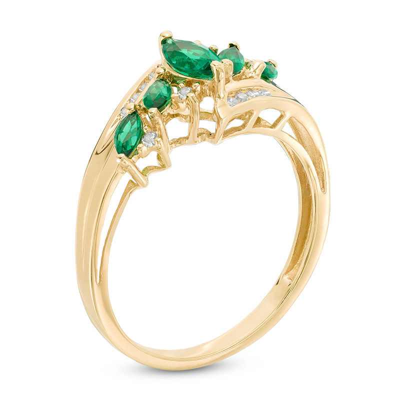 Marquise Lab-Created Emerald and 1/10 CT. T.W. Diamond Five Stone Ring in 10K Gold