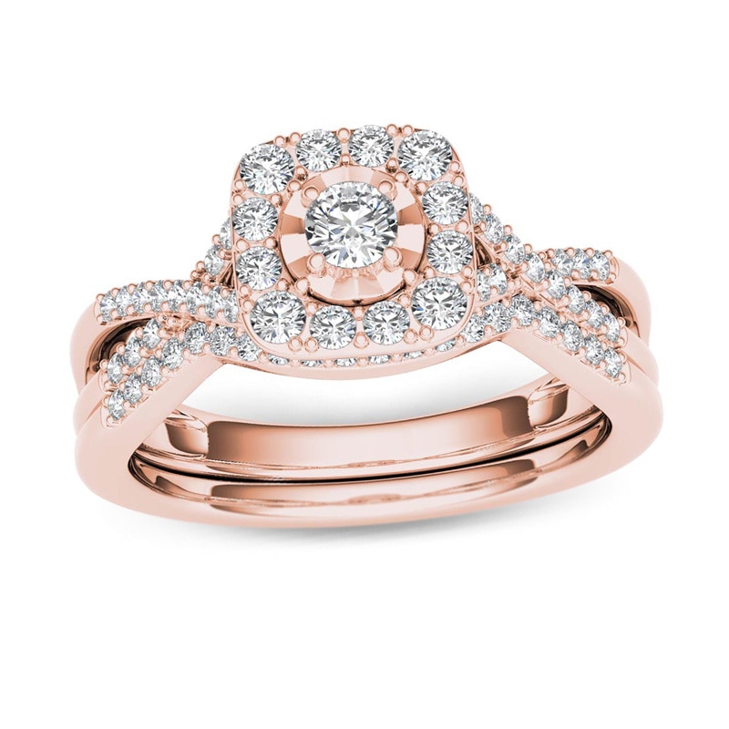 Main Image 1 of 3/8 CT. T.W. Diamond Cushion Frame Twist Shank Bridal Set in 14K Rose Gold