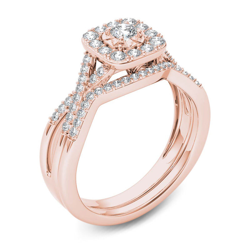 3/8 CT. T.W. Diamond Cushion Frame Twist Shank Bridal Set in 14K Rose Gold