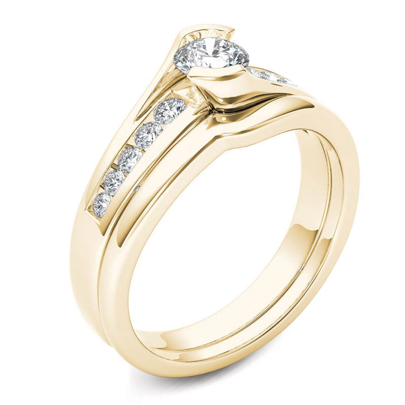1/2 CT. T.W. Diamond Bypass Bridal Set in 14K Gold