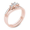 Thumbnail Image 2 of 1/2 CT. T.W. Princess-Cut Diamond Three Stone Bypass Bridal Set in 14K Rose Gold