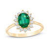 Thumbnail Image 0 of Oval Lab-Created Emerald and White Sapphire Starburst Frame Ring in 10K Gold