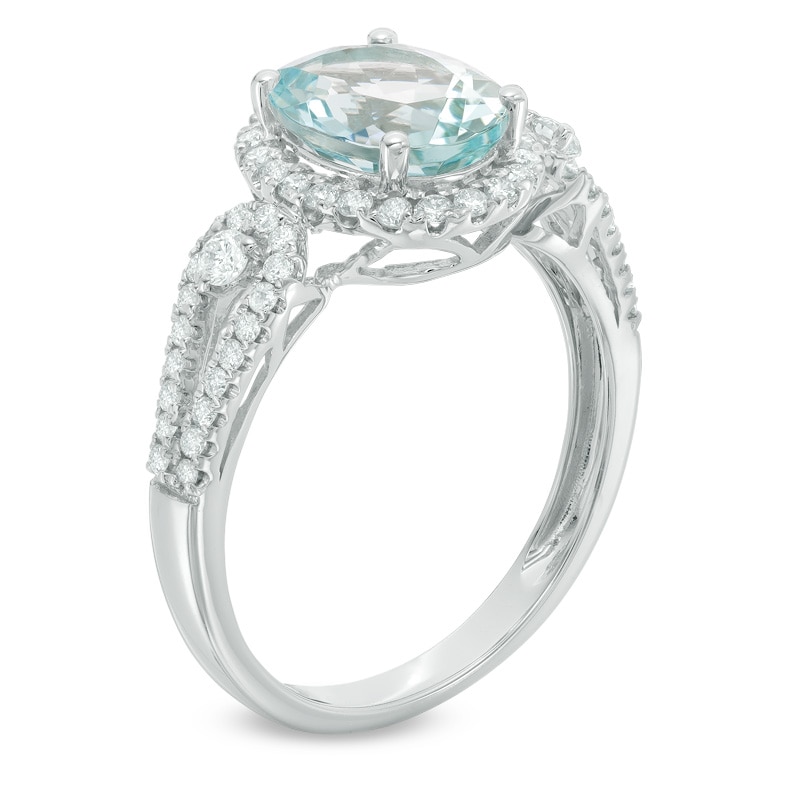 Oval Aquamarine and 1/3 CT. T.W. Diamond Frame Ring in 14K White Gold