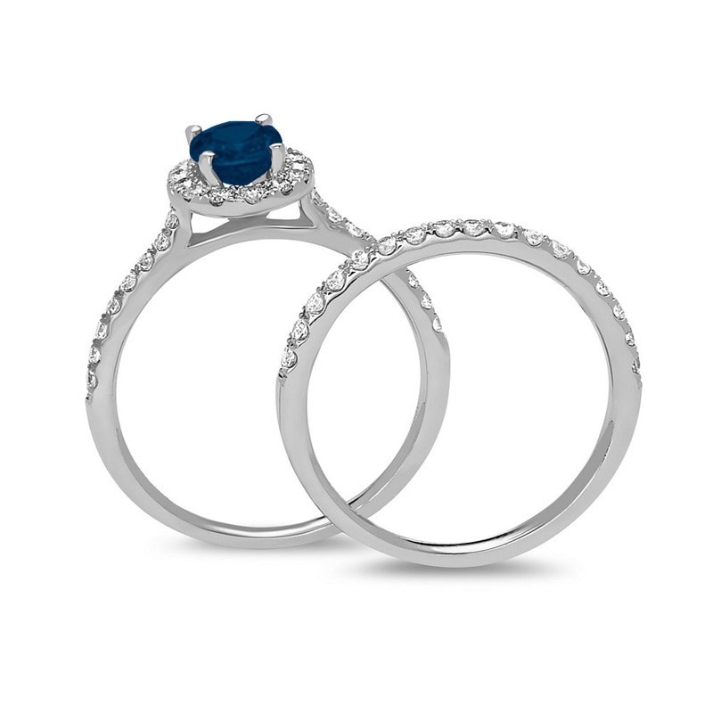 Oval Blue Sapphire and 5/8 CT. T.W. Diamond Frame Bridal Set in 14K White Gold