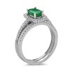 Thumbnail Image 1 of Oval Emerald and 1/3 CT. T.W. Diamond Frame Bridal Set in 14K White Gold