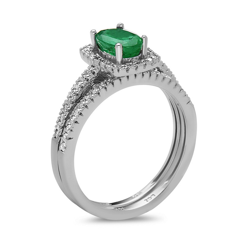 Oval Emerald and 1/3 CT. T.W. Diamond Frame Bridal Set in 14K White Gold