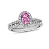 Thumbnail Image 0 of Oval Pink Sapphire and 5/8 CT. T.W. Diamond Frame Bridal Set in 14K White Gold