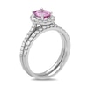 Thumbnail Image 1 of Oval Pink Sapphire and 5/8 CT. T.W. Diamond Frame Bridal Set in 14K White Gold