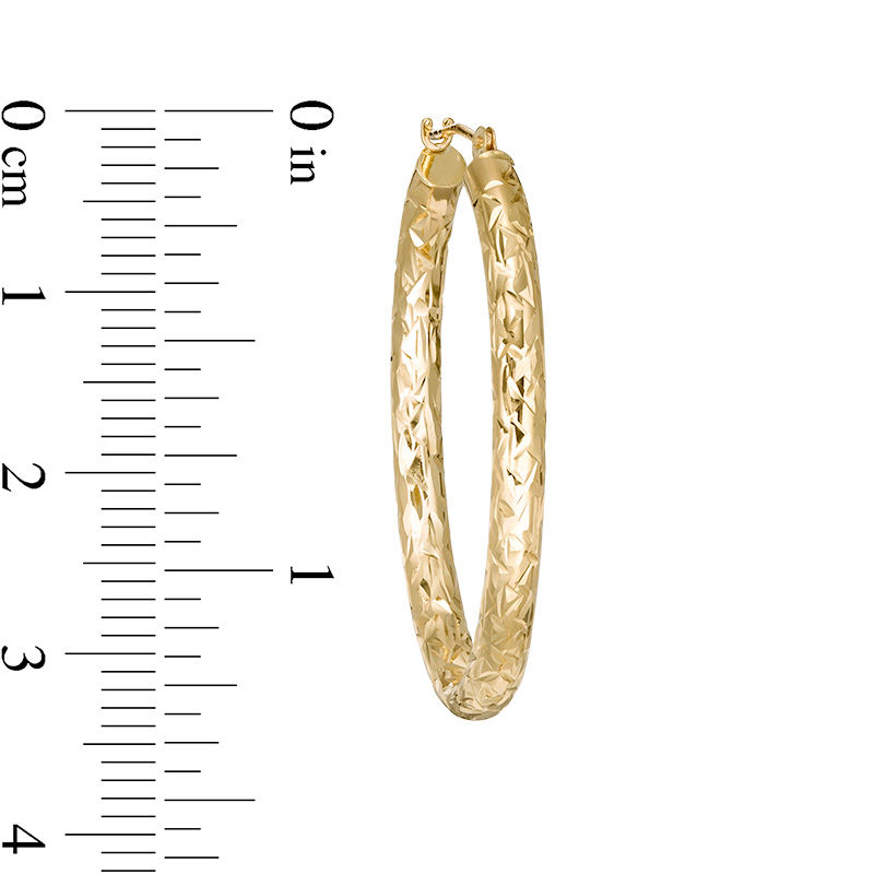 Main Image 2 of Diamond-Cut Oval Tube Hoop Earrings in 14K Gold