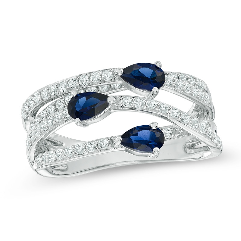 Lab-Created Blue and White Sapphire Three Stone Orbit Ring in Sterling Silver