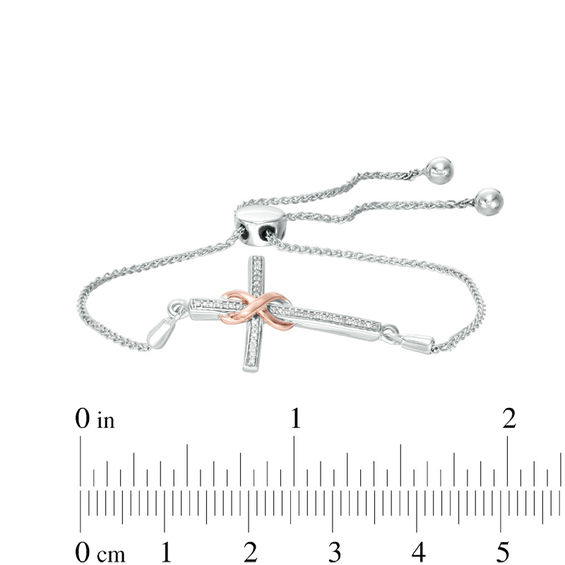 1/15 CT. T.w. Diamond Infinity Wrap Cross Bolo Bracelet in Sterling Silver and 10K Rose Gold - 9.5"
