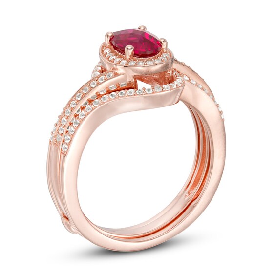 Oval Lab-Created Ruby and White Sapphire Swirl Frame Bridal Set in Sterling Silver and 14K Rose Gold Plate Oval Lab-Created Ruby and White Sapphire Swirl Frame Bridal Set in Sterling Silver and 14K Rose Gold Plate