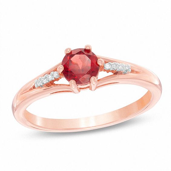 Oval Ruby and 1/10 CT. T.W. Diamond Frame Vintage-Style Ring in 10K Gold |  Zales