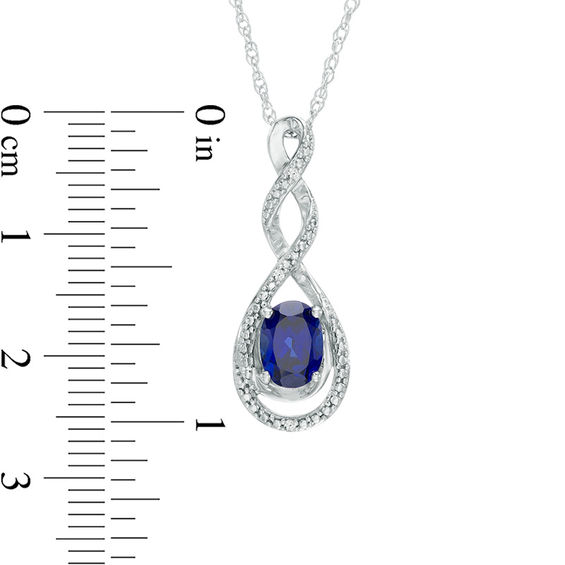 Oval Lab-Created Blue and White Sapphire Infinity Pendant in Sterling Silver