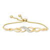 Thumbnail Image 1 of 1/15 CT. T.W.  Diamond Twist Bolo Bracelet in 10K Gold - 9.5"