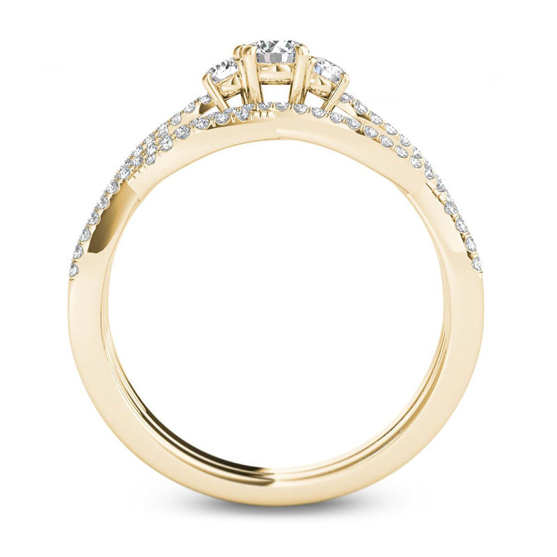 1/2 CT. T.W. Diamond Three Stone Twist Bridal Set in 14K Gold