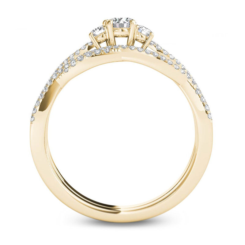 Main Image 3 of 1/2 CT. T.W. Diamond Three Stone Twist Bridal Set in 14K Gold