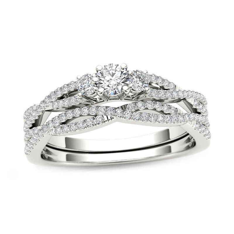 Main Image 1 of 1/2 CT. T.W. Diamond Three Stone Twist Bridal Set in 14K White Gold