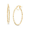 Thumbnail Image 0 of Oval Twist Hoop Earrings in 14K Gold