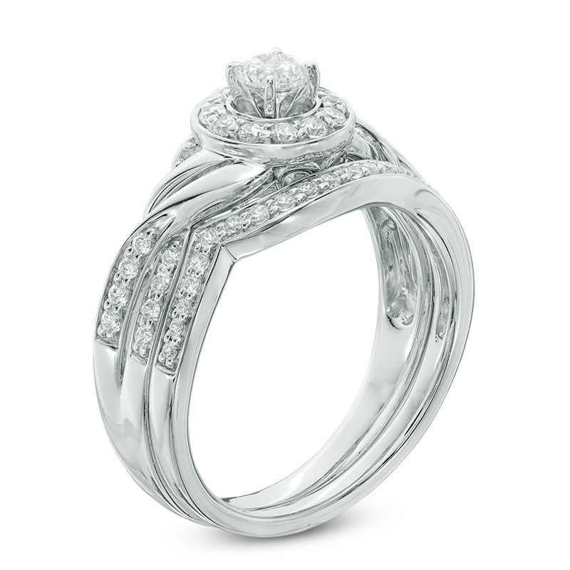 5/8 CT. T.W. Diamond Frame Twist Bridal Set in 10K White Gold