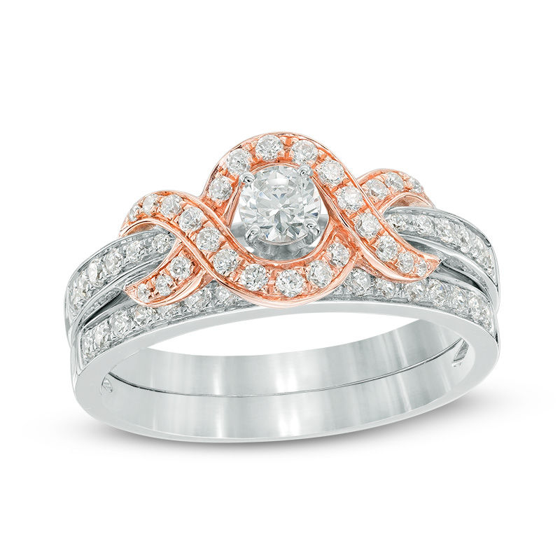 Main Image 1 of 3/4 CT. T.W. Diamond Swirl Frame Bridal Set in 14K Two-Tone Gold