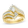 Thumbnail Image 0 of 3/4 CT. T.W. Marquise Diamond Bypass Bridal Set in 14K Gold