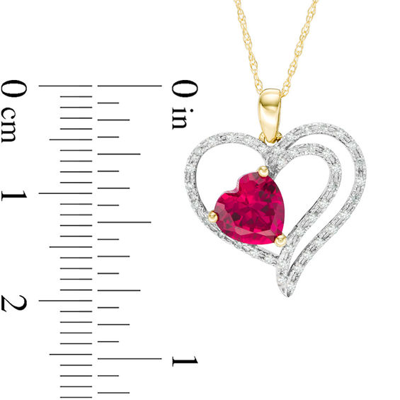 7.0mm Lab-Created Ruby and 1/6 CT. T.w. Diamond Multi-Row Heart Pendant in 10K Gold
