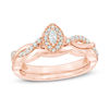 Thumbnail Image 1 of 1/4 CT. T.W. Marquise Diamond Frame Twist Bridal Set in 10K Rose Gold