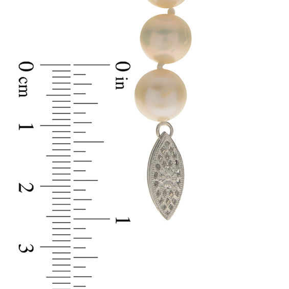 8.5 - 9.5mm Oval Cultured Freshwater Pearl Strand Necklace with Sterling Silver Clasp - 50" 8.5 - 9.5mm Oval Cultured Freshwater Pearl Strand Necklace with Sterling Silver Clasp - 50"