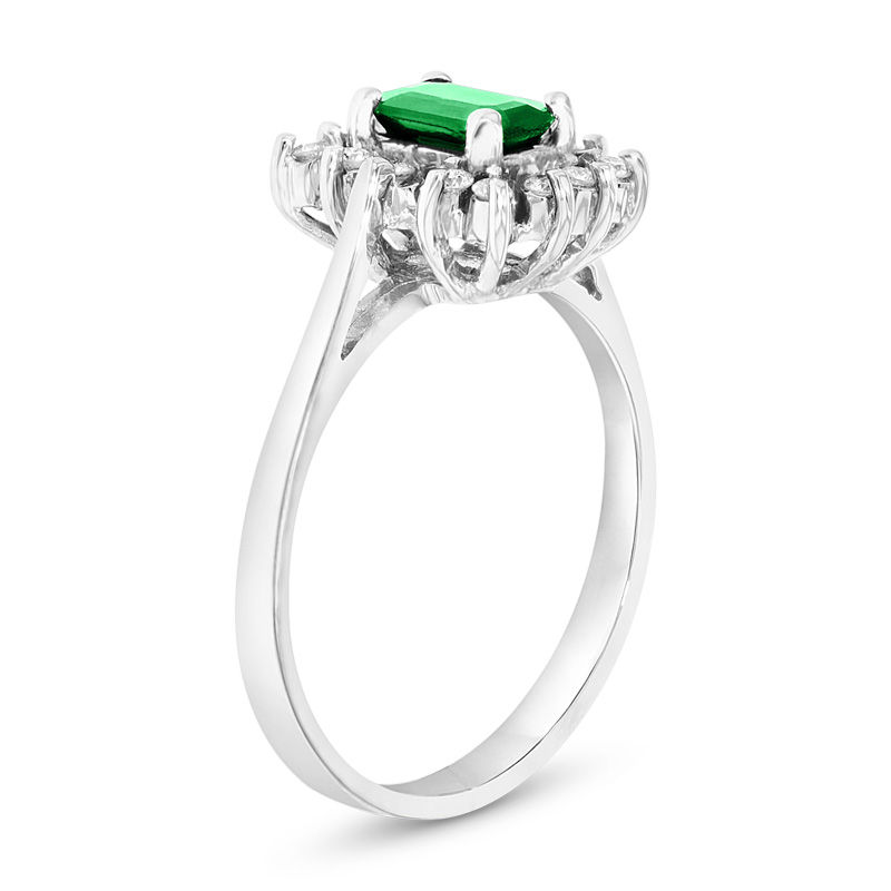 Emerald-Cut Emerald and 1/8 CT. T.W. Diamond Starburst Frame Ring in 14K White Gold