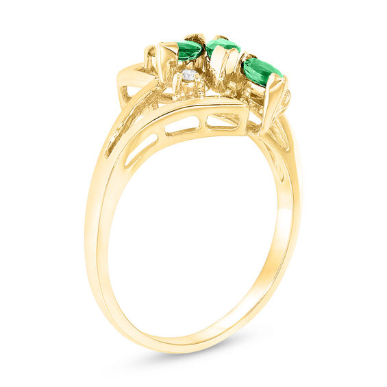 Marquise Emerald and Diamond Accent Three Stone Bypass Ring in 14K Gold