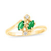Thumbnail Image 0 of Marquise Emerald and Diamond Accent Bypass Ring in 14K Gold