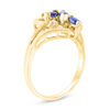 Thumbnail Image 2 of Marquise Blue Sapphire and Diamond Accent Three Stone Bypass Ring in 14K Gold