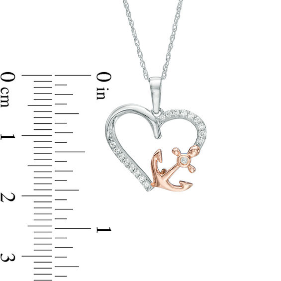 1/10 CT. T.w. Diamond Heart with Side Anchor Pendant in 10K Two-Tone Gold