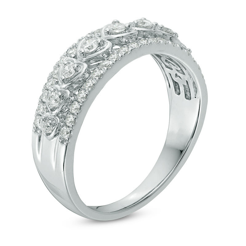 1/2 CT. T.W. Diamond Heart Frame Nine Stone Anniversary Band in 14K White Gold