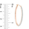 Thumbnail Image 1 of Diamond Fascination™ Oval Hoop Earrings in 14K Rose Gold