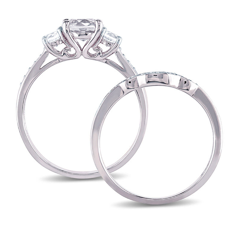 6.0mm Lab-Created White Sapphire and 1/8 CT. T.W. Diamond Three Stone Bridal Set in 10K White Gold