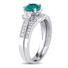 Thumbnail Image 1 of 6.0mm Lab-Created Emerald and White Sapphire with 1/8 CT. T.W. Diamond Three Stone Bridal Set in 10K White Gold