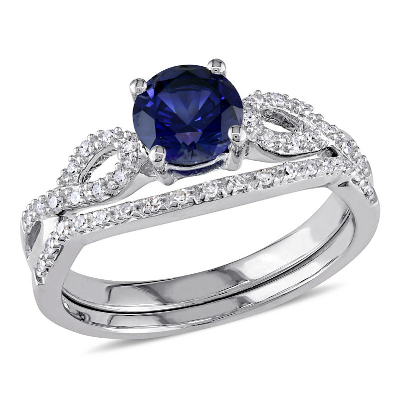 6.0mm Lab-Created Blue Sapphire and 1/8 CT. T.W. Diamond Twist Shank Bridal Set in 10K White Gold